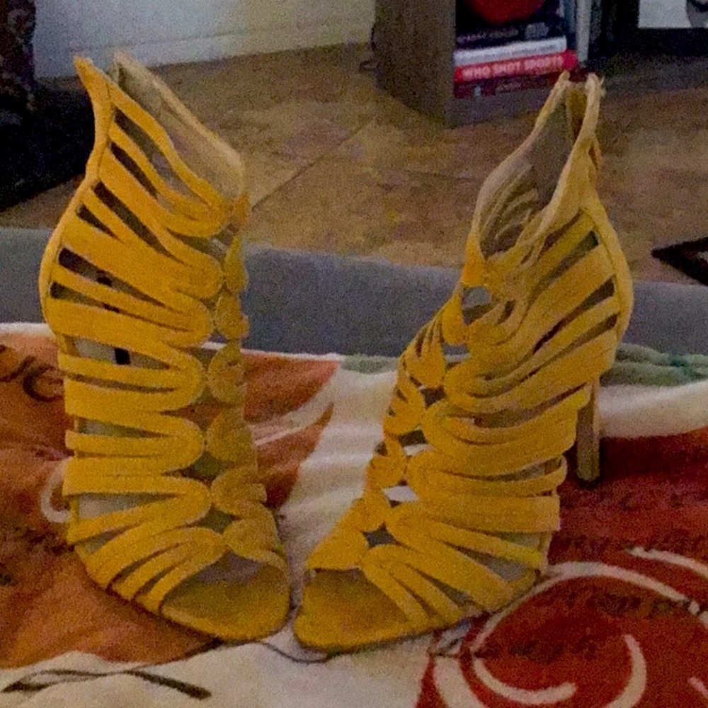 Mustard colored stilettos with back zip and 4” heel.